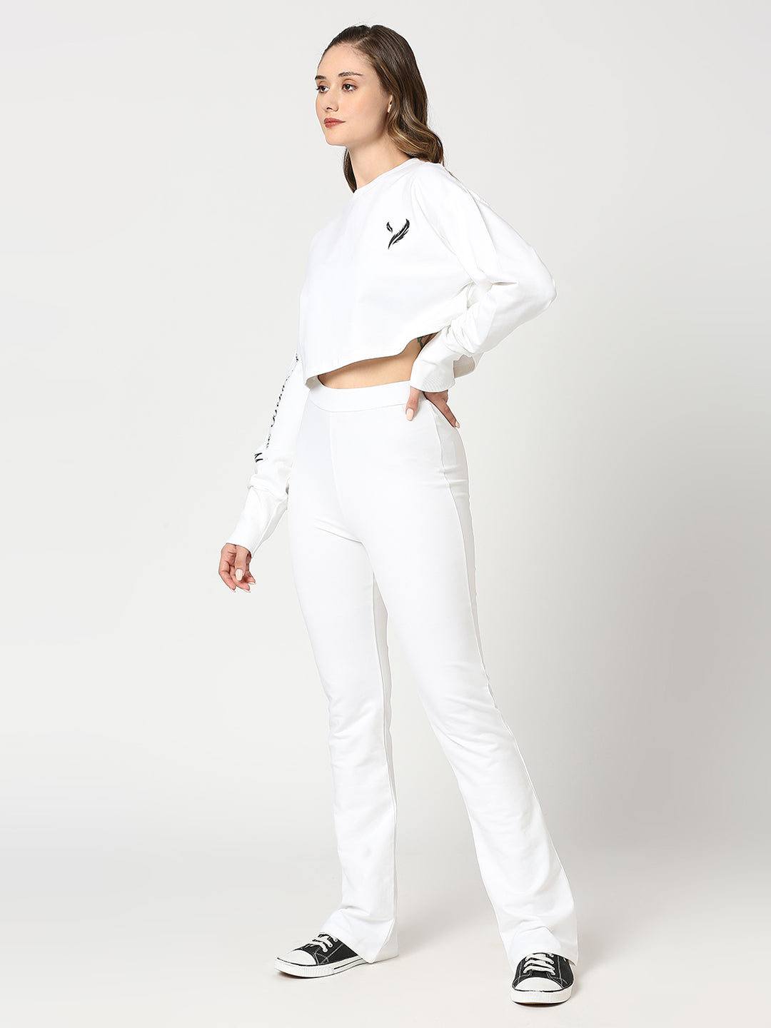 Bright white cropped top and full pants Co-Ords set.